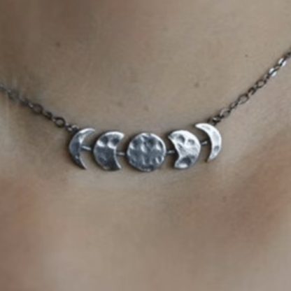 Close up of the Silver Plated Moon Phases Necklace.